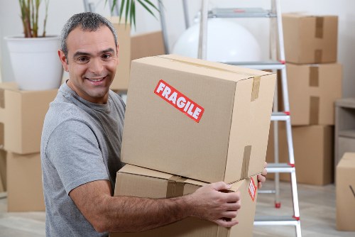 Man and van moving boxes and furniture in Lisson Grove