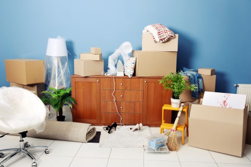 Packed moving boxes and household items prepared for removals in Lissongrove