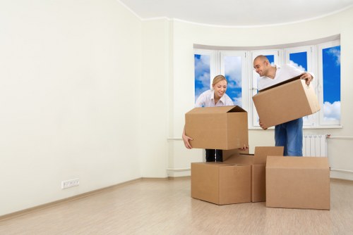 Careful packing materials and labelled boxes for a home move in Lissongrove