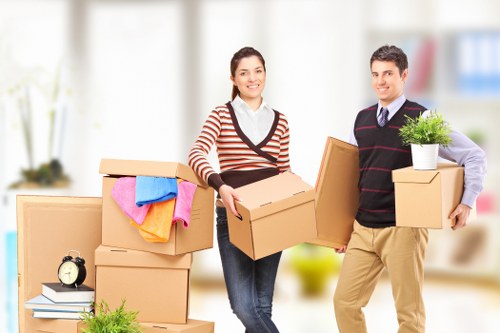 Fragile household items safely arranged inside moving boxes in Lissongrove