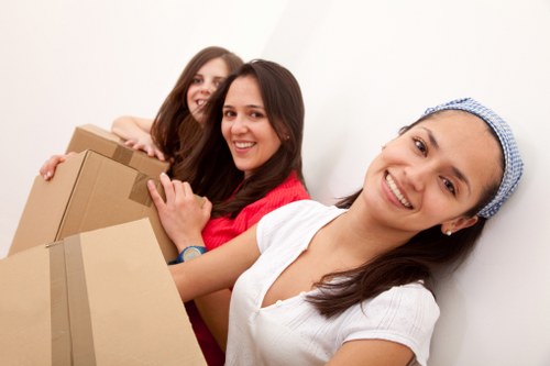 Professional movers loading household items for a Lisson Grove relocation