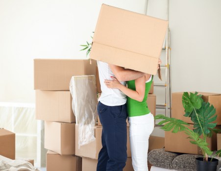 Professional packing team preparing boxes in a Lisson Grove property