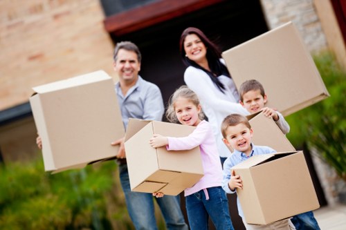 Boxes, desks, and business equipment loaded for a local commercial move