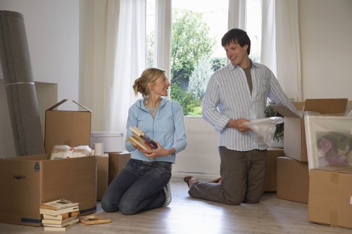 Packed boxes and furniture ready for domestic removals in a Lisson Grove property