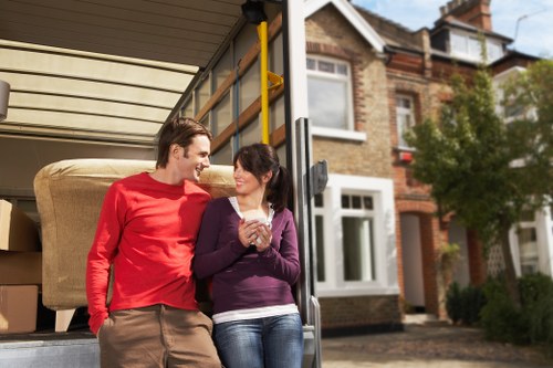 House removal service loading furniture into a moving van in Lissongrove