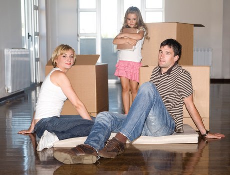Packing boxes and furniture for a removal van service